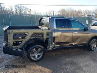 2022 Honda Ridgeline RTL-E with VIN 5FPYK3F79NB005152, listed as a IAAI auction lot 41754891 with 60,191 mi miles and . Bid and sale history available at DreamBid. Image 6.