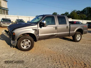 2010 Ford Super Duty F-250 SRW XL with VIN 1FTSW2BR7AEA73658, listed as a Copart auction lot 66893704 with 169,714 mi miles and Salvage Title. Bid and sale history available at carsss.com. Image 1.