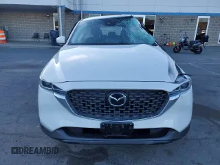 2023 Mazda CX-5 2.5 S with VIN JM3KFBAM6P0269481, listed as a Copart auction lot 87222194 with 21,070 mi miles and Salvage Title. Bid and sale history available at carsss.com. Image 5.