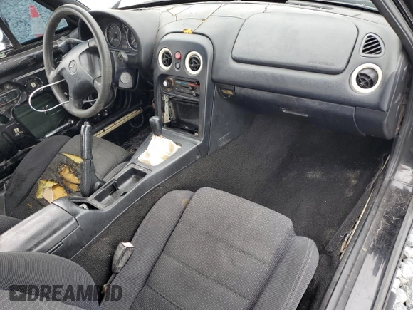 1994 Mazda MX-5 Miata with VIN JM1NA3534R0513305, listed as a Copart auction lot 52489865 with 150,481 mi miles and Salvage title. Bid and sale history available at DreamBid. Image 8.