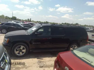 2013 Chevrolet Suburban LT with VIN 1GNSCJE05DR142688, listed as a IAAI auction lot 42214548 with 236,464 mi miles and . Bid and sale history available at DreamBid. Image 14.