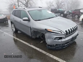 2015 Jeep Cherokee Limited z VIN 1C4PJMDSXFW716778, wystawiony jako IAAI lot #41574565 z przebiegiem 205 307 mil mil oraz . Historia ofert i sprzedaży dostępna na DreamBid. Obrazek 1.
