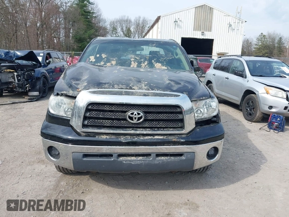 2007 Toyota Tundra SR5 z VIN 5TFBT54117X005726, wystawiony jako IAAI lot #42105716 z przebiegiem 84 828 mil mil oraz . Historia ofert i sprzedaży dostępna na DreamBid. Obrazek 12.