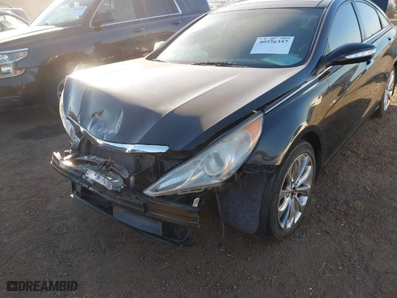 2012 Hyundai Sonata 2.0T SE with VIN 5NPEC4ABXCH464909, listed as a IAAI auction lot 40926357 with 59,230 mi miles. Bid and sale history available at carsss.com. Image 6.