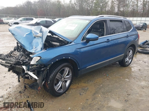 2020 Volkswagen Tiguan SE z VIN 3VV3B7AX5LM176136, wystawiony jako IAAI lot #41564431 z przebiegiem 74 867 mil mil oraz . Historia ofert i sprzedaży dostępna na DreamBid. Obrazek 18.