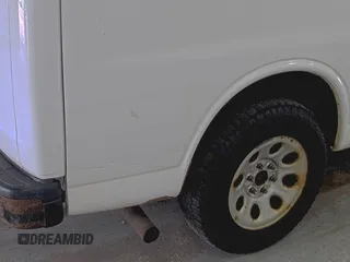 2014 Chevrolet Express Cargo z VIN 1GCSGAFX7E1163258, wystawiony jako IAAI lot #42501106 z przebiegiem 214 104 mil mil oraz . Historia ofert i sprzedaży dostępna na DreamBid. Obrazek 31.