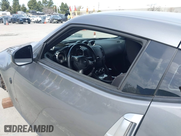 2012 Nissan 370Z Touring with VIN JN1AZ4EH4CM561415, listed as a IAAI auction lot 41838948 with 111,298 mi miles. Bid and sale history available at carsss.com. Image 6.
