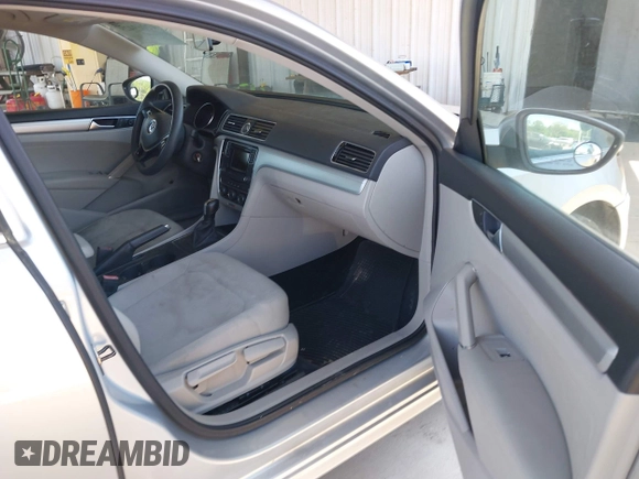 2016 Volkswagen Passat S with VIN 1VWAS7A38GC031521, listed as a IAAI auction lot 42069429 with 94,938 mi miles and . Bid and sale history available at DreamBid. Image 5.