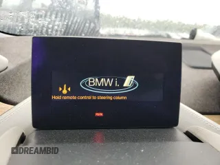 2014 BMW i3 z VIN WBY1Z2C59EV284055, wystawiony jako Copart lot #56345995 z przebiegiem Nie podano mil oraz Tytuł czysty. Historia ofert i sprzedaży dostępna na DreamBid. Obrazek 9.
