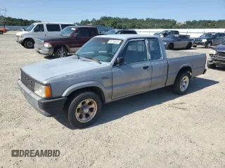 1993 Mazda B-Series Truck z VIN JM2UF3130P0378304, wystawiony jako Copart lot #58799925 z przebiegiem 132 801 mil mil oraz Szkoda całkowita • Salvage title. Historia ofert i sprzedaży dostępna na DreamBid. Obrazek 1.