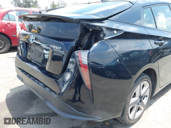 2017 Toyota Prius Two with VIN JTDKARFUXH3041668, listed as a IAAI auction lot 42421754 with 57,677 mi miles and . Bid and sale history available at DreamBid. Image 6.