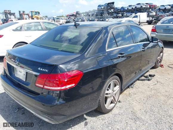 2014 Mercedes-Benz E-Class E 350 Luxury with VIN WDDHF8JB7EA791635, listed as a IAAI auction lot 41999708 with 133,509 mi miles. Bid and sale history available at carsss.com. Image 4.