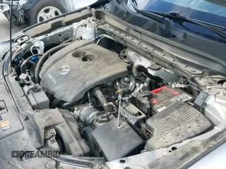 2022 Mazda CX-5 S Carbon Edition с VIN JM3KFBCMXN1557475, выставлен на аукционе IAAI как лот 42313581 с пробегом 81 276 миль миль и . История ставок и продаж доступна на DreamBid. Изображение 19.