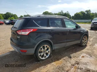 2013 Ford Escape Titanium z VIN 1FMCU0J94DUB90197, wystawiony jako Copart lot #59289925 z przebiegiem 200 006 mil mil oraz Czysty tytuł • Clean title. Historia ofert i sprzedaży dostępna na DreamBid. Obrazek 3.