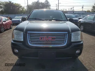 2006 GMC Envoy SLT with VIN 1GKDT13S862238613, listed as a Copart auction lot 70585704 with 147,337 mi miles and Salvage Title. Bid and sale history available at carsss.com. Image 5.