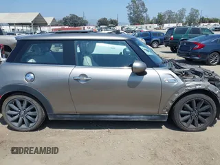 2017 MINI Hardtop Cooper S with VIN WMWXP7C34H2C61768, listed as a IAAI auction lot 42579522 with 67,876 mi miles and . Bid and sale history available at DreamBid. Image 14.