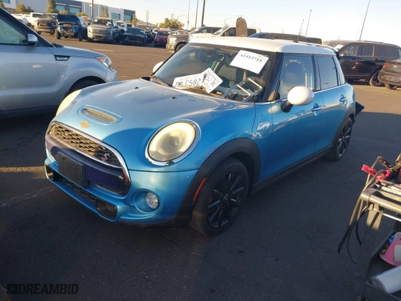 2015 MINI Cooper Hardtop 4 Door S with VIN WMWXU3C58F2B58305, listed as a IAAI auction lot 41413715 with 98,413 mi miles. Bid and sale history available at carsss.com. Image 18.