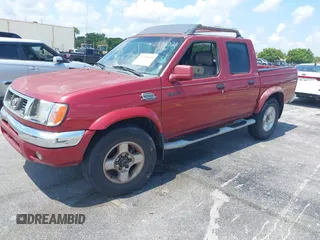 2000 Nissan Frontier XE z VIN 1N6ED27Y3YC382842, wystawiony jako IAAI lot #42343459 z przebiegiem 172 454 mil mil oraz . Historia ofert i sprzedaży dostępna na DreamBid. Obrazek 2.