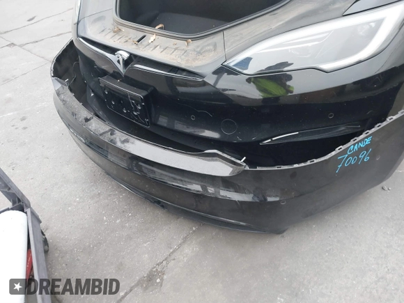 2022 Tesla Model S with VIN 5YJSA1E55NF474342, listed as a IAAI auction lot 41870994 with 33,804 mi miles and . Bid and sale history available at DreamBid. Image 12.