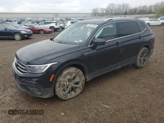 2022 Volkswagen Tiguan SE z VIN 3VV3B7AX2NM030909, wystawiony jako Copart lot #53622025 z przebiegiem 128 210 mil mil oraz Czysty tytuł • Clean title. Historia ofert i sprzedaży dostępna na DreamBid. Obrazek 1.