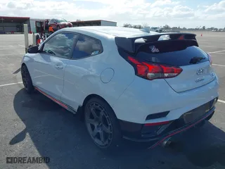 2019 Hyundai Veloster N with VIN KMHT36AH6KU001916, listed as a IAAI auction lot 41577775 with 77,471 mi miles. Bid and sale history available at carsss.com. Image 3.