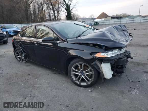 2017 Ford Fusion SE z VIN 3FA6P0HD1HR312200, wystawiony jako Copart lot #82823184 z przebiegiem Nie podano mil oraz Szkoda całkowita • Salvage title. Historia ofert i sprzedaży dostępna na DreamBid. Obrazek 4.