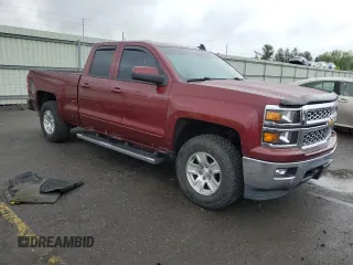 2015 Chevrolet Silverado 1500 LT with VIN 1GCVKREC4FZ301432, listed as a Copart auction lot 57184285 with 186,534 mi miles and Clean Title. Bid and sale history available at DreamBid. Image 4.