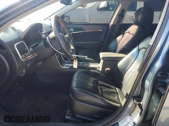 2011 Lincoln MKZ Hybrid z VIN 3LNDL2L3XBR775589, wystawiony jako Copart lot #50796705 z przebiegiem 84 973 mil mil oraz Szkoda całkowita • Salvage title. Historia ofert i sprzedaży dostępna na DreamBid. Obrazek 7.