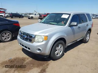 2009 Ford Escape XLS with VIN 1FMCU02749KC57784, listed as a IAAI auction lot 41981387 with 216,935 mi miles and . Bid and sale history available at DreamBid. Image 6.