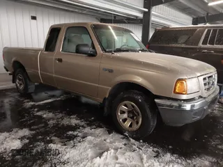 2001 Ford Ranger XL with VIN 1FTYR14V31PB58474, listed as a IAAI auction lot 41806958 with 300,219 mi miles. Bid and sale history available at carsss.com. Image 1.