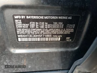2017 BMW X1 xDrive28i with VIN WBXHT3C30H5F71865, listed as a Copart auction lot 67841122 with 75,471 mi miles. Bid and sale history available at carsss.com. Image 14.