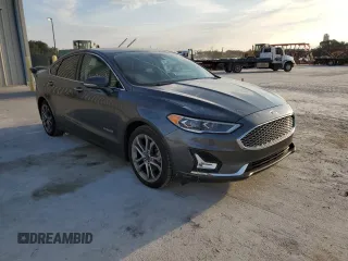 2019 Ford Fusion Hybrid Titanium with VIN 3FA6P0RU9KR116785, listed as a Copart auction lot 68052202 with 89,486 mi miles. Bid and sale history available at carsss.com. Image 4.