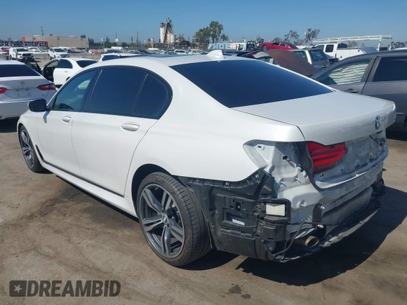 2019 BMW 7 Series 740i with VIN WBA7E2C53KB454816, listed as a IAAI auction lot 42539294 with 73,363 mi miles and . Bid and sale history available at DreamBid. Image 3.