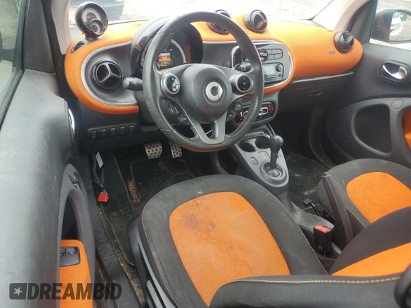 2016 Smart fortwo Passion with VIN WMEFJ5DA0GK060576, listed as a Copart auction lot 55641565 with 99,558 mi miles and Salvage title. Bid and sale history available at DreamBid. Image 8.