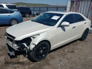 2014 Cadillac ATS Standard RWD with VIN 1G6AA5RA5E0161724, listed as a IAAI auction lot 41977910 with 81,205 mi miles and . Bid and sale history available at DreamBid. Image 2.