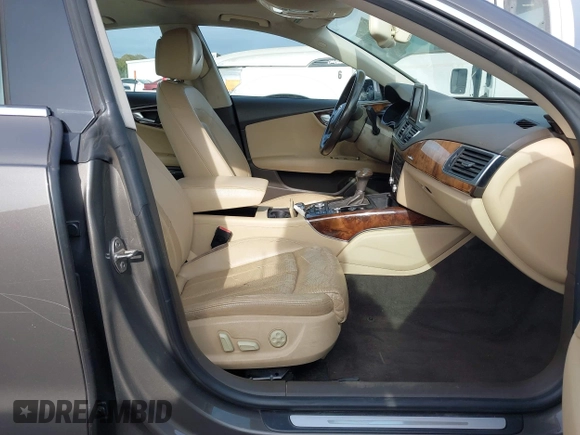 2012 Audi A7 Prestige с VIN WAU2GAFC7CN122113, выставлен на аукционе IAAI как лот 42111441 с пробегом 149 617 миль миль и . История ставок и продаж доступна на DreamBid. Изображение 5.