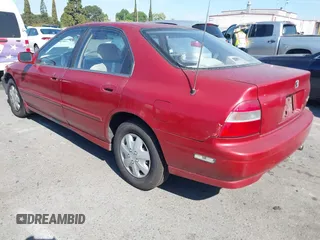 1994 Honda Accord LX w/ABS with VIN JHMCD5632RC001368, listed as a IAAI auction lot 42021408 with 204,391 mi miles. Bid and sale history available at carsss.com. Image 3.