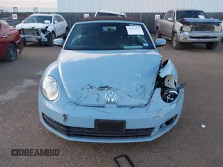 2013 Volkswagen Beetle 2.5L with VIN 3VW5P7AT9DM811542, listed as a IAAI auction lot 41683361 with 79,018 mi miles and . Bid and sale history available at DreamBid. Image 12.