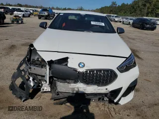 2020 BMW 2 Series M235i xDrive with VIN WBA13AL07L7F58999, listed as a Copart auction lot 77858084 with 19,833 mi miles and Salvage Title. Bid and sale history available at carsss.com. Image 5.