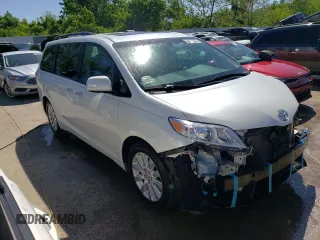 2014 Toyota Sienna XLE with VIN 5TDYK3DC6ES427920, listed as a Copart auction lot 54075594 with 127,018 mi miles and Salvage title. Bid and sale history available at DreamBid. Image 4.