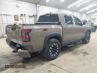2024 Nissan Frontier SV with VIN 1N6ED1EK8RN613989, listed as a IAAI auction lot 42310148 with 14,202 mi miles and . Bid and sale history available at DreamBid. Image 4.