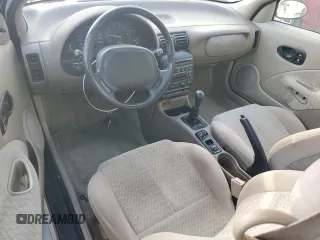 1999 Saturn SC with VIN 1G8ZR1275XZ375833, listed as a Copart auction lot 87960885 with 97,697 mi miles and Salvage Title. Bid and sale history available at carsss.com. Image 8.