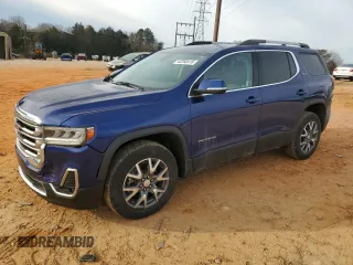 2023 GMC Acadia SLT with VIN 1GKKNML4XPZ115277, listed as a Copart auction lot 42260415 with 27,245 mi miles and Salvage Title. Bid and sale history available at DreamBid. Image 1.