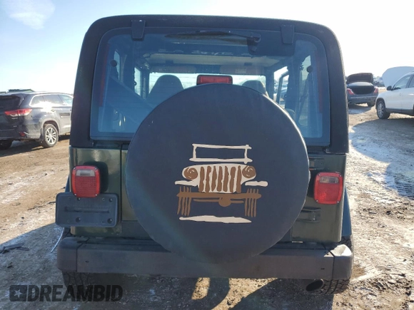 1997 Jeep Wrangler Sahara with VIN 1J4FY49S2VP542031, listed as a Copart auction lot 42509765 with 136,689 mi miles and Salvage Title. Bid and sale history available at carsss.com. Image 6.