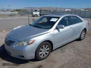 2007 Toyota Camry Hybrid with VIN JTNBB46K273004879, listed as a IAAI auction lot 42009322 with 167,445 mi miles. Bid and sale history available at carsss.com. Image 2.