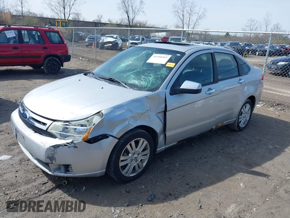 2011 Ford Focus SEL with VIN 1FAHP3HN1BW189263, listed as a IAAI auction lot 41958502 with 157,608 mi miles. Bid and sale history available at carsss.com. Image 2.