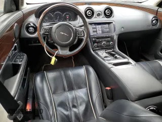 2014 Jaguar XJ Portfolio with VIN SAJWJ2GD2E8V62696, listed as a Copart auction lot 76620494 with 85,487 mi miles and Salvage title. Bid and sale history available at DreamBid. Image 8.