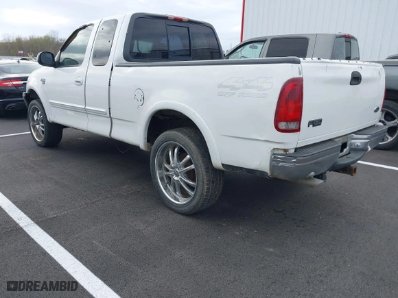 2000 Ford F-150 XL with VIN 1FTRX18W0YNA85809, listed as a IAAI auction lot 41848764 with 1 mi miles. Bid and sale history available at carsss.com. Image 3.