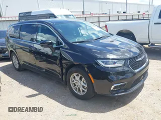 2024 Chrysler Pacifica Touring L with VIN 2C4RC1BG0RR139658, listed as a IAAI auction lot 42807226 with 51,253 mi miles and . Bid and sale history available at DreamBid. Image 1.