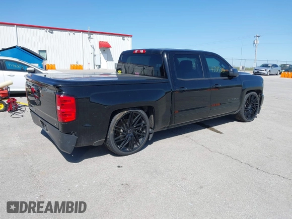 2017 Chevrolet Silverado 1500 LT with VIN 3GCUKREC5HG407502, listed as a IAAI auction lot 42013284 with 79,638 mi miles and . Bid and sale history available at DreamBid. Image 4.